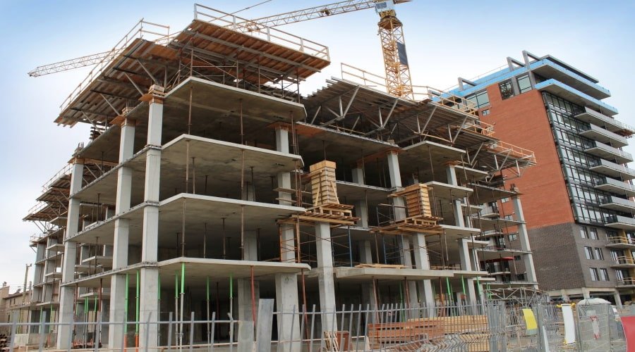 Commercial building construction process with steel framework